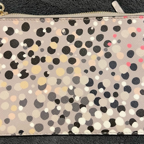 Brand New grey polka dotted Kate Spade wristlet. - Picture 2 of 3